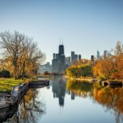 Chicago skyline reflected in canal during fall season